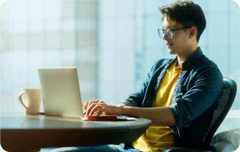 man with a laptop working